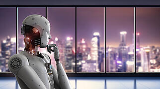 android robot thinking in office